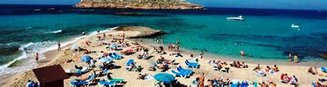 Einer der größten strände von ibiza mit vielen verschiedenen zonen. Cala Conta strand, Ibiza west | Ibizavakanties.com