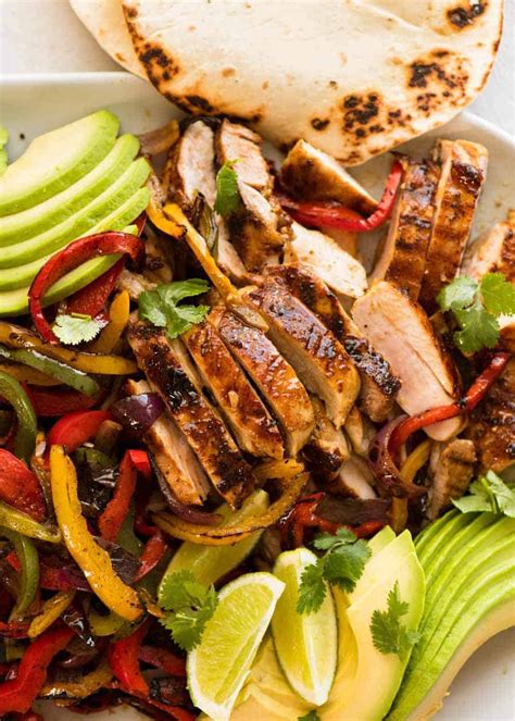Tender cooked chicken, sweet onions, and crunchy fresh bell peppers are the main ingredients needed for. Chicken Fajitas | RecipeTin Eats
