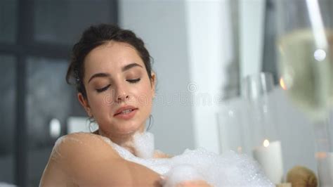 Side View Of Hot Woman Washing Legs With Foam Romantic Girl Taking Bath At Home Stock Footage
