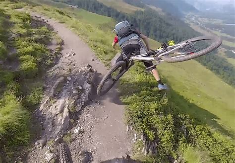 Watch Bike Plummets Off The Side Of A Mountain Following Minor Crash