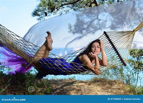 Girl In A Hammock On A Tropical Coast Stock Image Image Of Blue