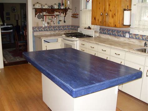 Your kitchen countertops can be the centerpiece of your kitchen, so they should be made of the best and most beautiful materials available. Kitchen Blue Corian Countertops | Corian kitchen ...