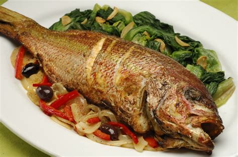 Tourism Observer Prepare Grilled Whole Fish