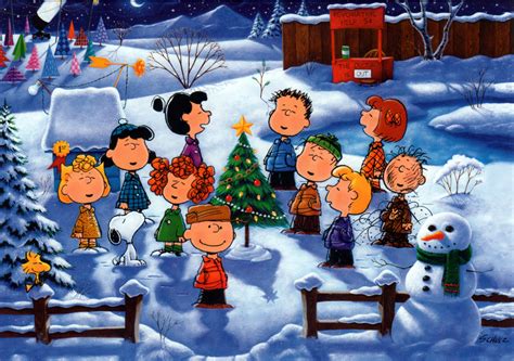 Peanuts Singing Around A Christmas Tree At Night Looks More Like A