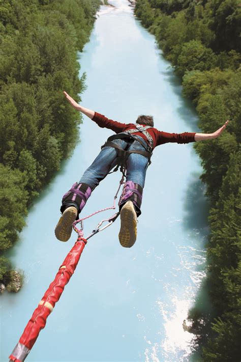 Exciting Experience Of The Bungee Jump From The Bridge Over The River