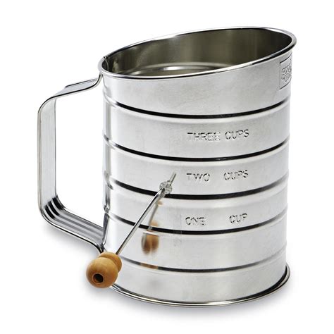 A metal flour sifter has two layers of wire screen with a sifting mechanism between them. Essential Home 3-Cup Flour Sifter