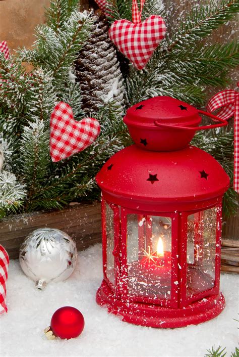 Download Beautiful Christmas Lantern With Red Candle Wallpaper