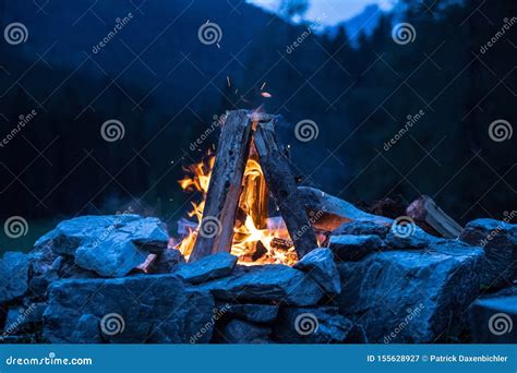 Camping Bonfire With Yellow And Red Flames In Summer Forest Copy