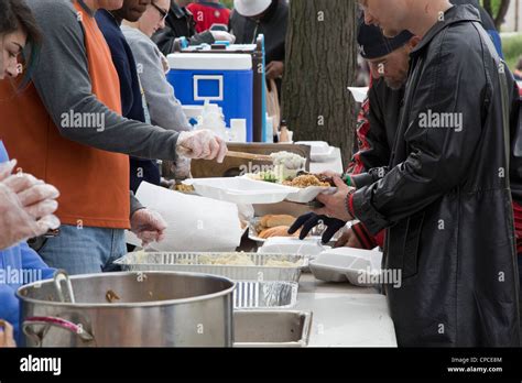 Detroit Michigan Volunteers Feed Homeless People From Tables Set Up