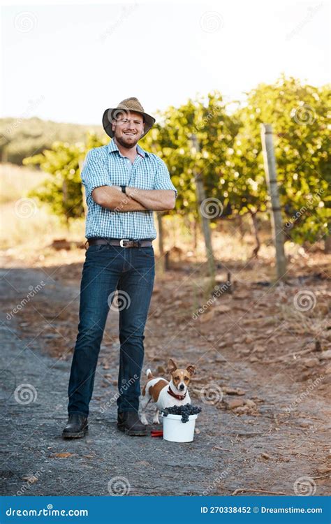 Its Been A Fruitful Day On The Farm Portrait Of A Farmer And His Dog
