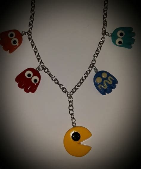 Maybe you would like to learn more about one of these? Pacman Polymer Clay · A Clay Character Necklace · Jewelry ...