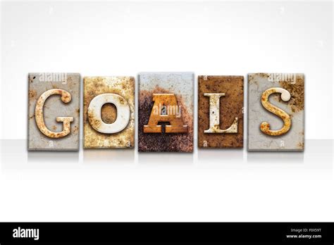 The Word Goals Written In Rusty Metal Letterpress Type Isolated On A