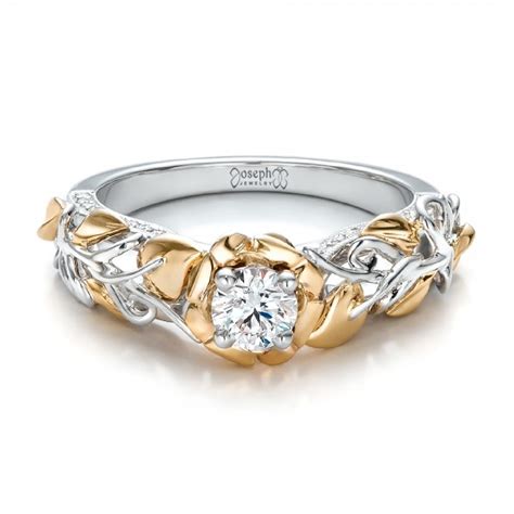 Three brilliant round diamonds, flanked on either side by 14k white gold rectangles, sparkle in layers of 14k yellow gold in this dashing men's engagement ring. Custom Two-Tone Gold Organic Vines and Diamond Engagement Ring