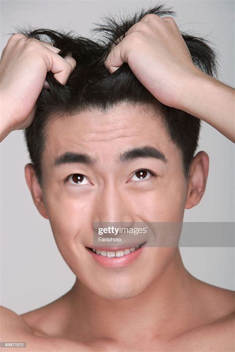 Man Pulling On Hair High Res Stock Photo Getty Images