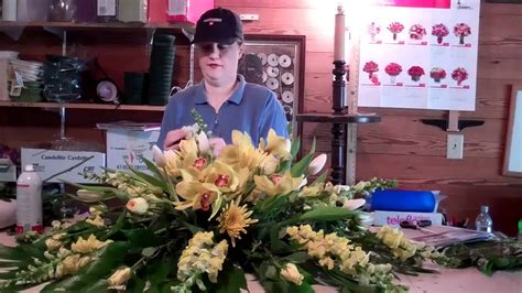 From the coffin, to the flowers, ceremonial vehicles and music. A peek inside the flower barn as I make a casket spray ...