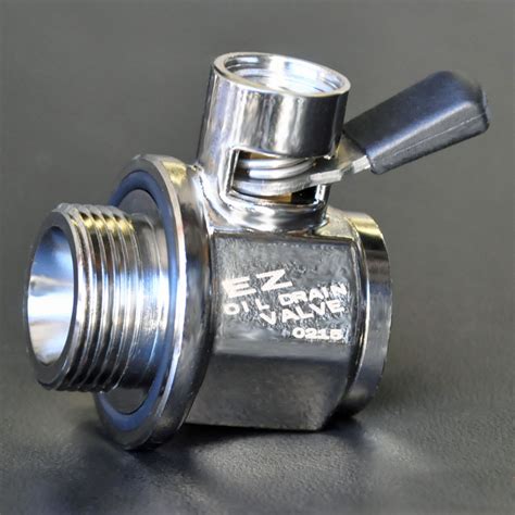 I got the adaptor on ok, after some grinding of the hex head for clearance. EZ Oil Drain Valve EZ-205 Thread size : 1 1/8"-12 UNF | eBay