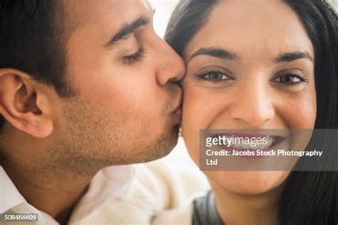 indian couple kiss photos and premium high res pictures getty images