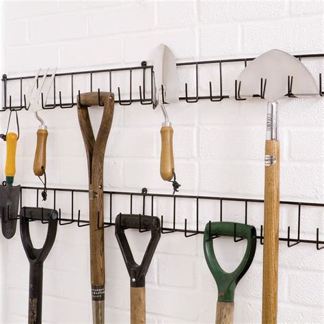 It gets the point that you have so much you don't know where to put them. Tool Racks | Garden tool rack, Garden tool storage, Tool rack
