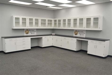 Storage cabinets designed for use in laboratory settings; 29' Fisher American Cabinets w/ 24' Wall Units | National ...
