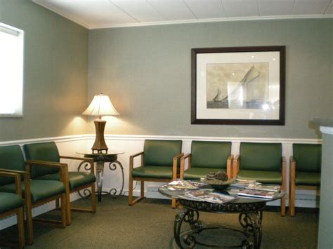 Whether in a hospital, medical office building, or urgent care center, healthcare waiting rooms aim to provide comfort and convenience. Waiting Room interior design with green chairs | Waiting ...