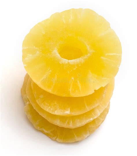 Slices Of Dried Pineapple On A White Isolated Background Vertical