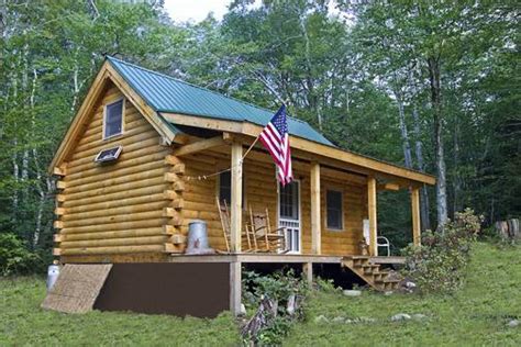 This Discoverer Log Cabin Has A Great Covered Porch