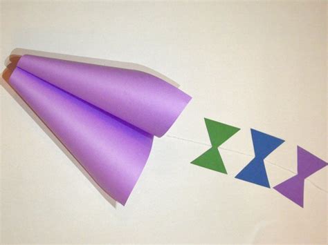 Easy Step By Step Instructions On How To Make A Kite Out Of Paper This