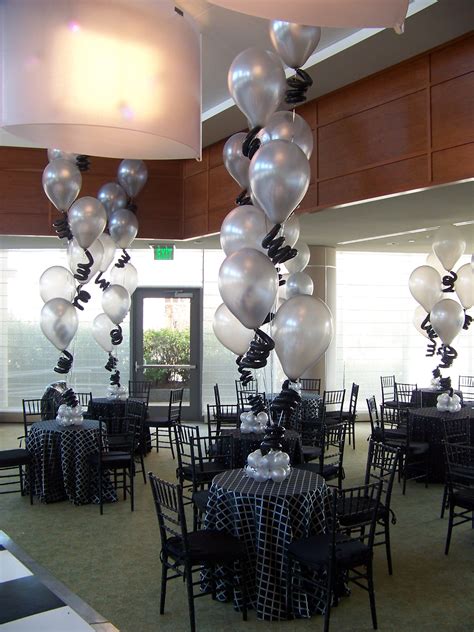 Tall Centerpieces Of Latex Balloons With Curlyqs For A Post Wedding