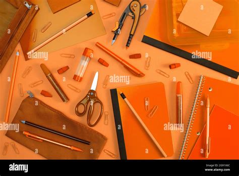 Orange Background Of School And Office Supplies Stock Photo Alamy
