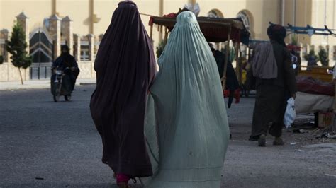 g7 decries taliban s burqa order for afghan women warns hard line group is further isolating itself