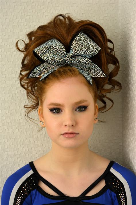 A mother claims her little cheerleader was kicked off the squad because her hair just wasn't straight. Cheer Hair | Cheer hair, Cheerleading hairstyles, Curly ...