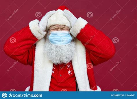 Sick Ill Santa Claus Wearing Face Mask Feeling Headache On Red