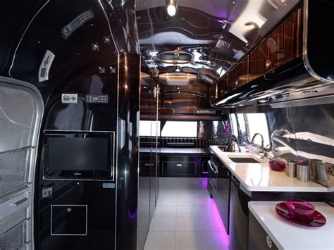 Over time the silver bullets become run down, damaged, and need extensive repairs. Modern Airstream restoration - Modern - Kitchen - other metro