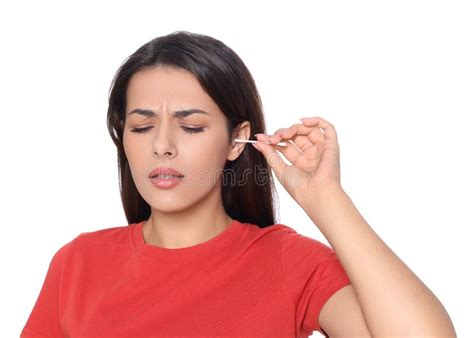 Young Woman Cleaning Ear With Cotton Swab On White Background Stock