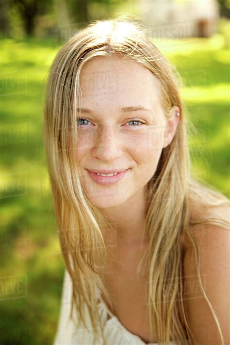 Portrait Of Young Blonde Woman Stock Photo Dissolve