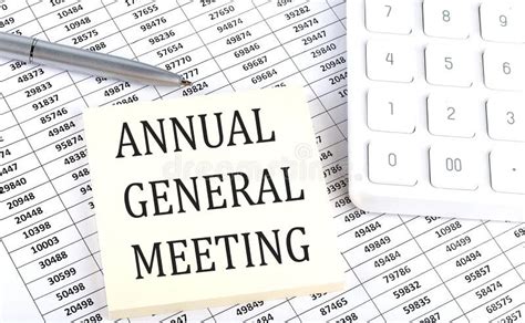 Annual General Meeting Business Concept Message On Sticker On Chart