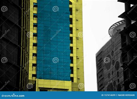 A Yellow And Blueish Modern Architectural Building Photo Stock Image