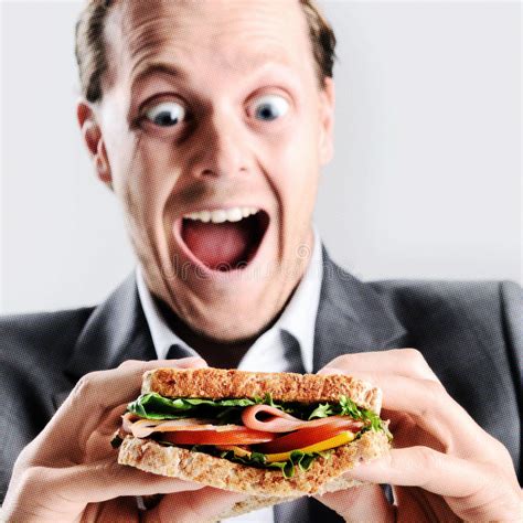 Sandwich Mangeur D Hommes Comique Avec L Expression Dr Le Photo Stock