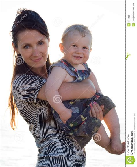 Mother Holding Her Son Stock Photo Image Of Beach