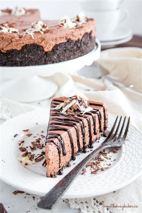 This luscious chocolate mousse cheesecake is baked in a water bath, keeping it light, creamy and chocolate mousse cheesecake. Easy No Bake Triple Chocolate Cheesecake - The Busy Baker