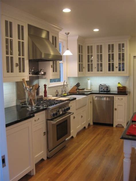 You are going to miss every second of your day when you are away from the kitchen if you have a homey kitchen. kitchens - glass-front white maple kitchen cabinets ...