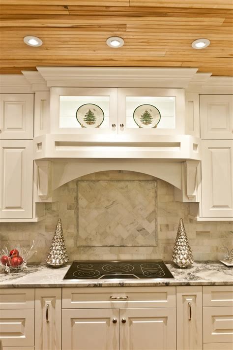 Crisp White Kitchen Cabinets With Marble Tile Backsplash Hgtv