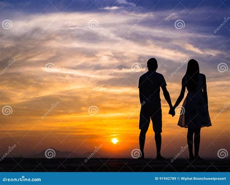 Silhouette Of Couple At Sunset Stock Image Image Of Kissing Silhouette 91942789