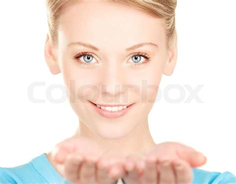 Beautiful Woman Showing Something On The Palms Of Her Hands Stock