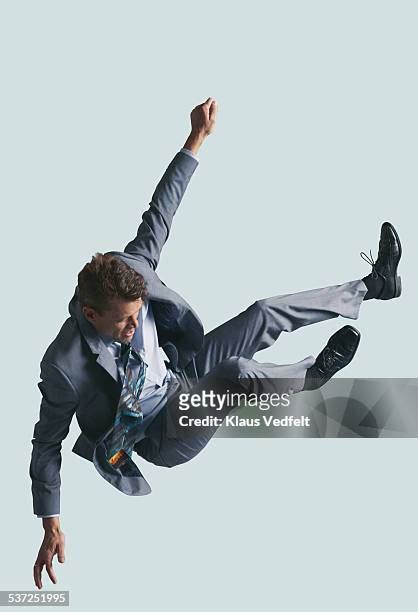 Man In Suit Falling Down Photos And Premium High Res Pictures Getty