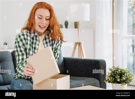 Happy Woman Portrait Unboxing Package After Delivery Stock Photo Alamy