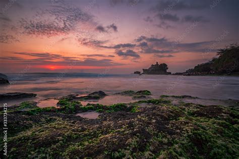 Pura Tanah Lot Temple Bali At Sunset For The Balinese Pura Tanah Lot Is One Of The Most