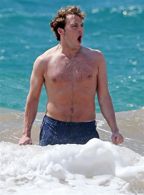 Sam Claflin Is Shirtless In Hawaii And Frolics In The Waves Socialite