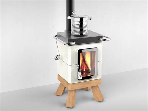 This tiny little heater/stove featured by the good survivalist actually burns wood. Wood-burning ceramic stove with Oven COOKINSTACK by LA ...