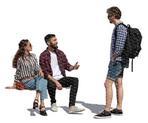 Two Cut Out People Sitting And Talking To A Man Standing In Front Of